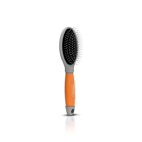 Wahl Pin Brush With Non-Slip Handle is a large brush with non-slip ergonomic gel handle for removing loose hair, debris and tangles while allowing you to groom your pet in comfort. The Ball pins glide smoothly through the coat collecting matted hair. Great for daily brushing removes dirt, debris and loose hair that can cause matting.